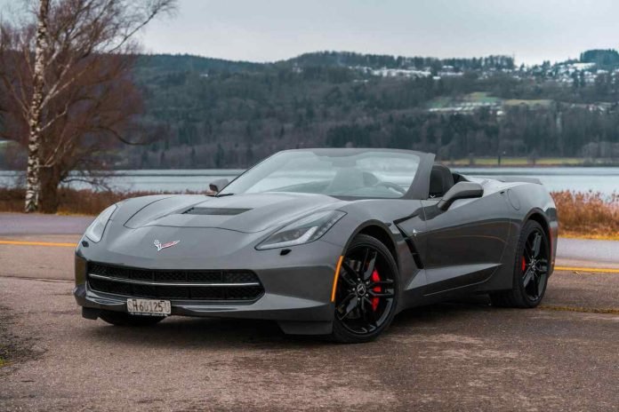 Futuristic grey convertible showcasing advanced automotive technology.