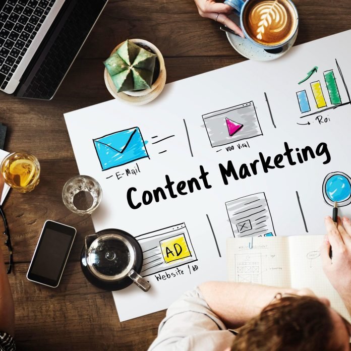 Strategic PR content marketing planning workspace with digital marketing visuals